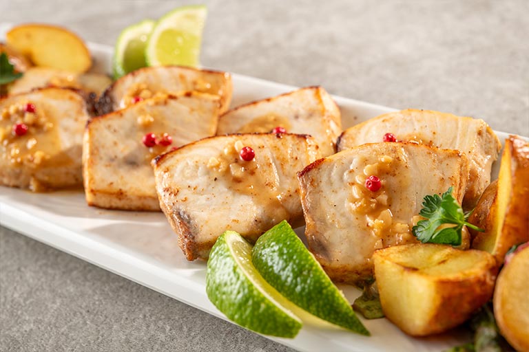 White fish grilled with garlic butter